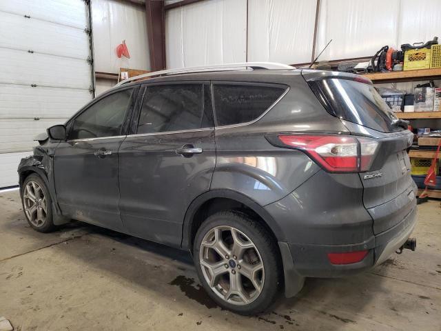 Obraz 2 z 2017 FORD ESCAPE TITANIUM 2017 z VIN 1FMCU9J99HUA04910
