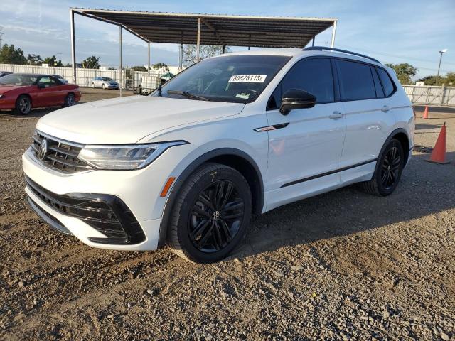 Image 1 of 2022 VOLKSWAGEN TIGUAN SE R-LINE BLACK 2022 with VIN 3VVCB7AX3NM027176