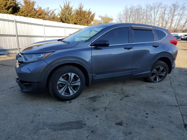 Image 1 of 2018 HONDA CR-V LX 2018 with VIN 5J6RW6H32JL000258