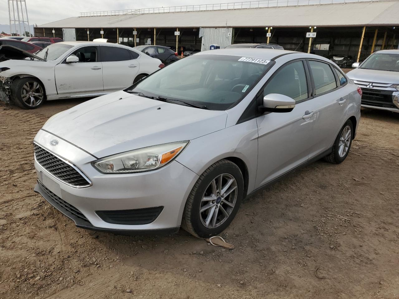 Image 1 of 2015 FORD FOCUS SE 2015 with VIN 1FADP3F27FL242904