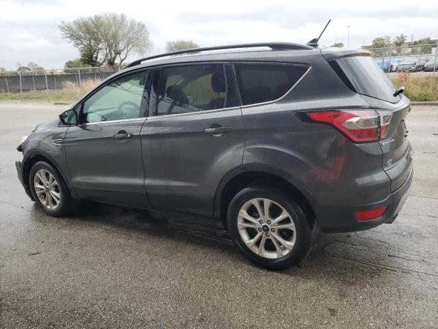 Изображение 2 2018 FORD ESCAPE SE 2018 с VIN 1FMCU0GDXJUA60898