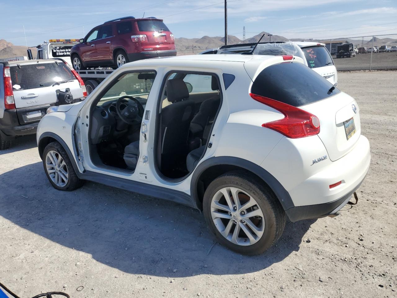 Obraz 2 z 2013 NISSAN JUKE S 2013 z VIN JN8AF5MR1DT220331