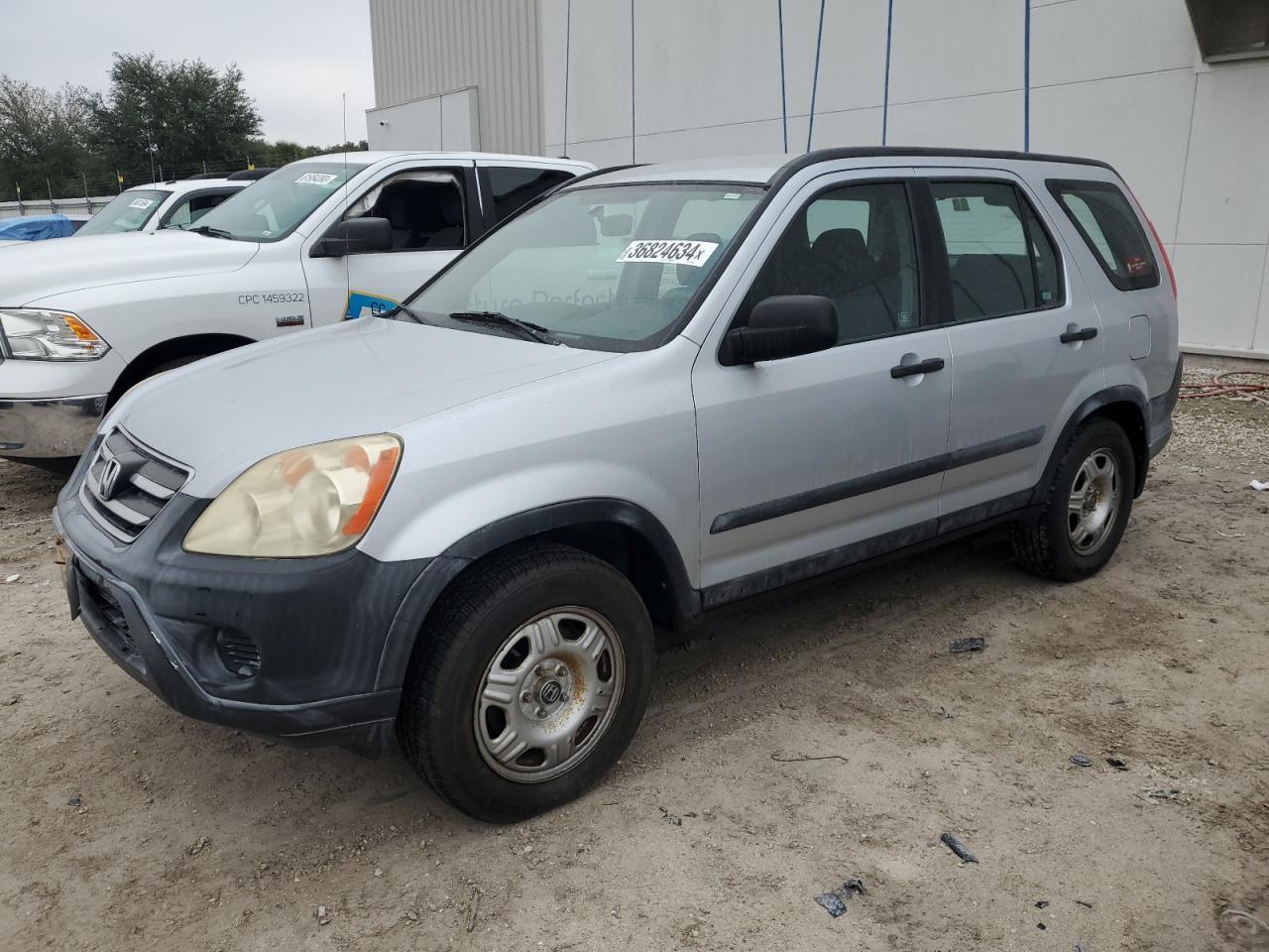 Image 1 of 2005 HONDA CR-V LX 2005 with VIN SHSRD68575U302319