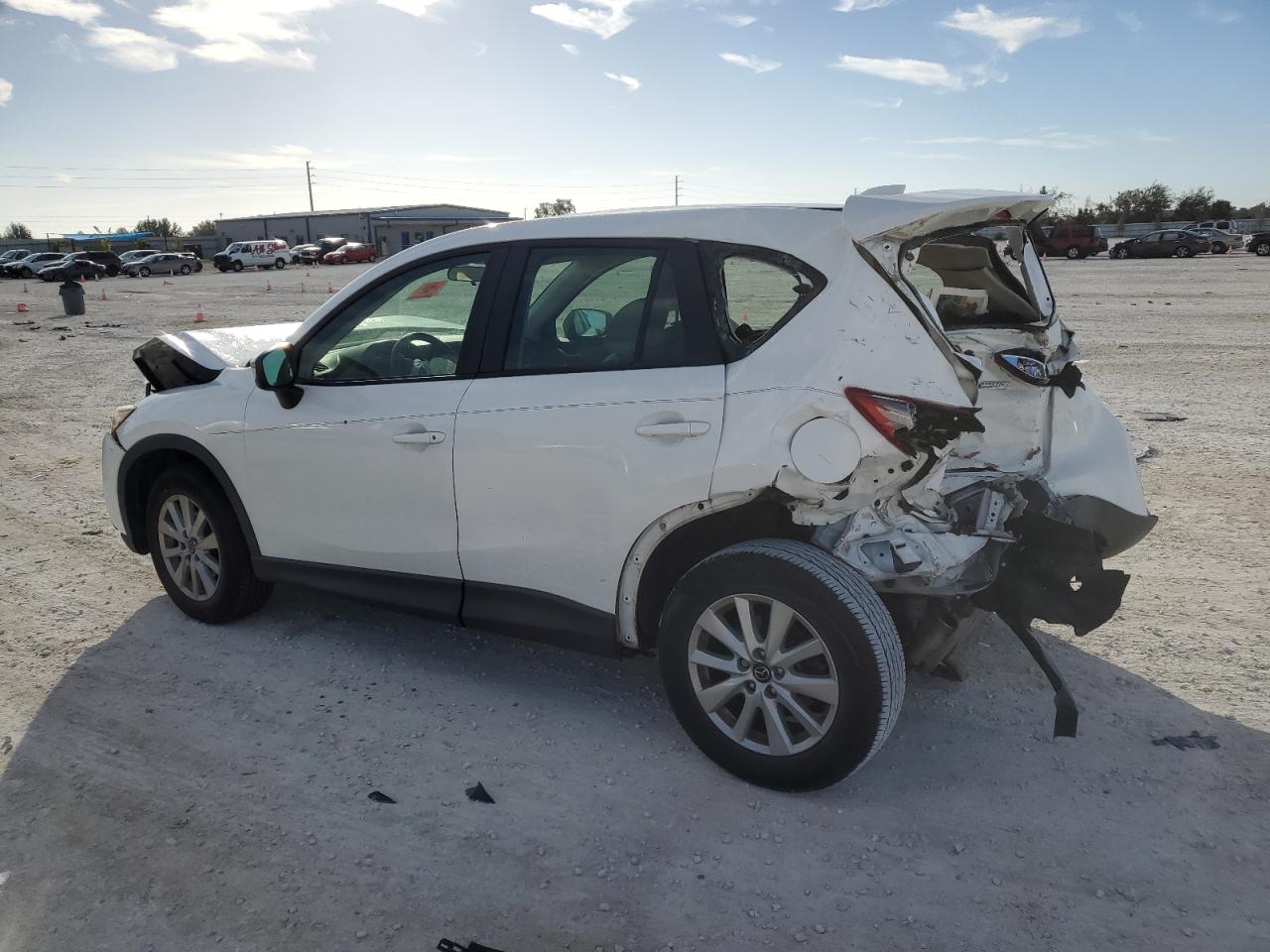 Image 2 of 2015 MAZDA CX-5 SPORT 2015 with VIN JM3KE2BE3F0506744