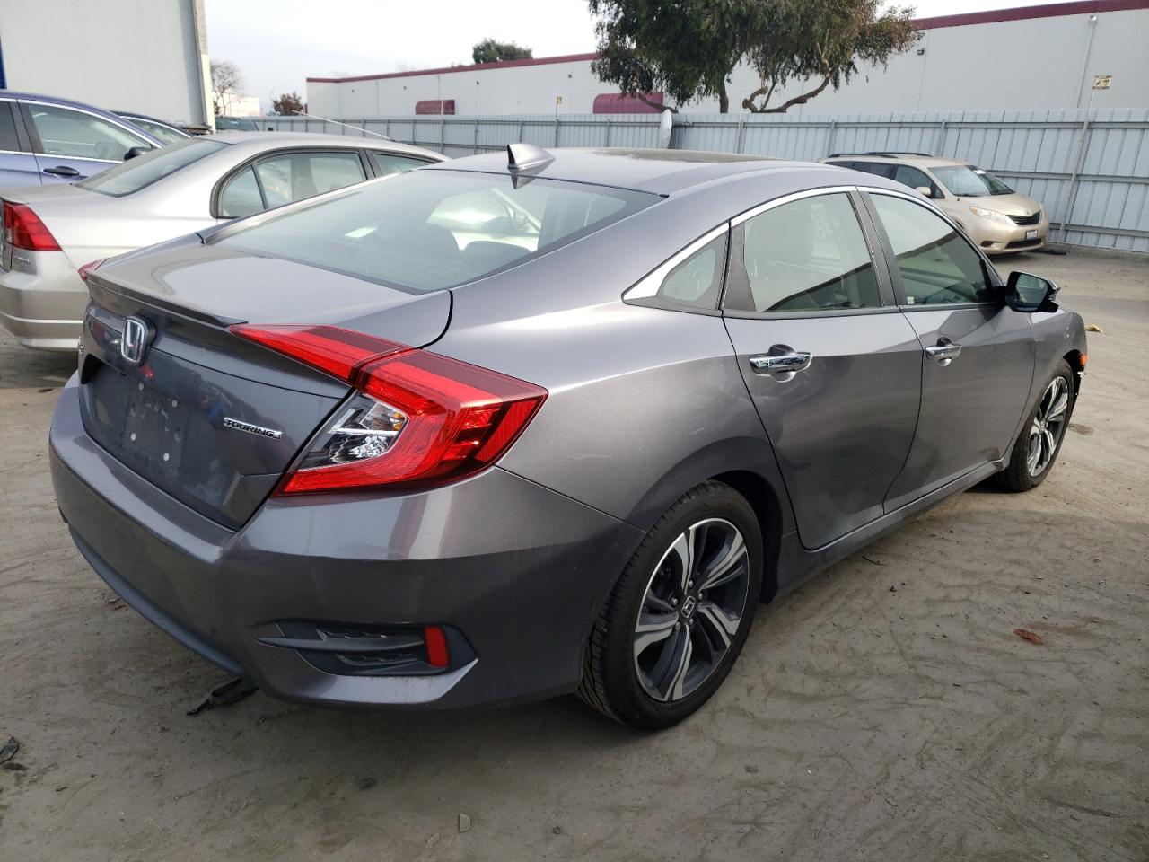 Image 3 of 2018 HONDA CIVIC TOURING 2018 with VIN JHMFC1F9XJX010524