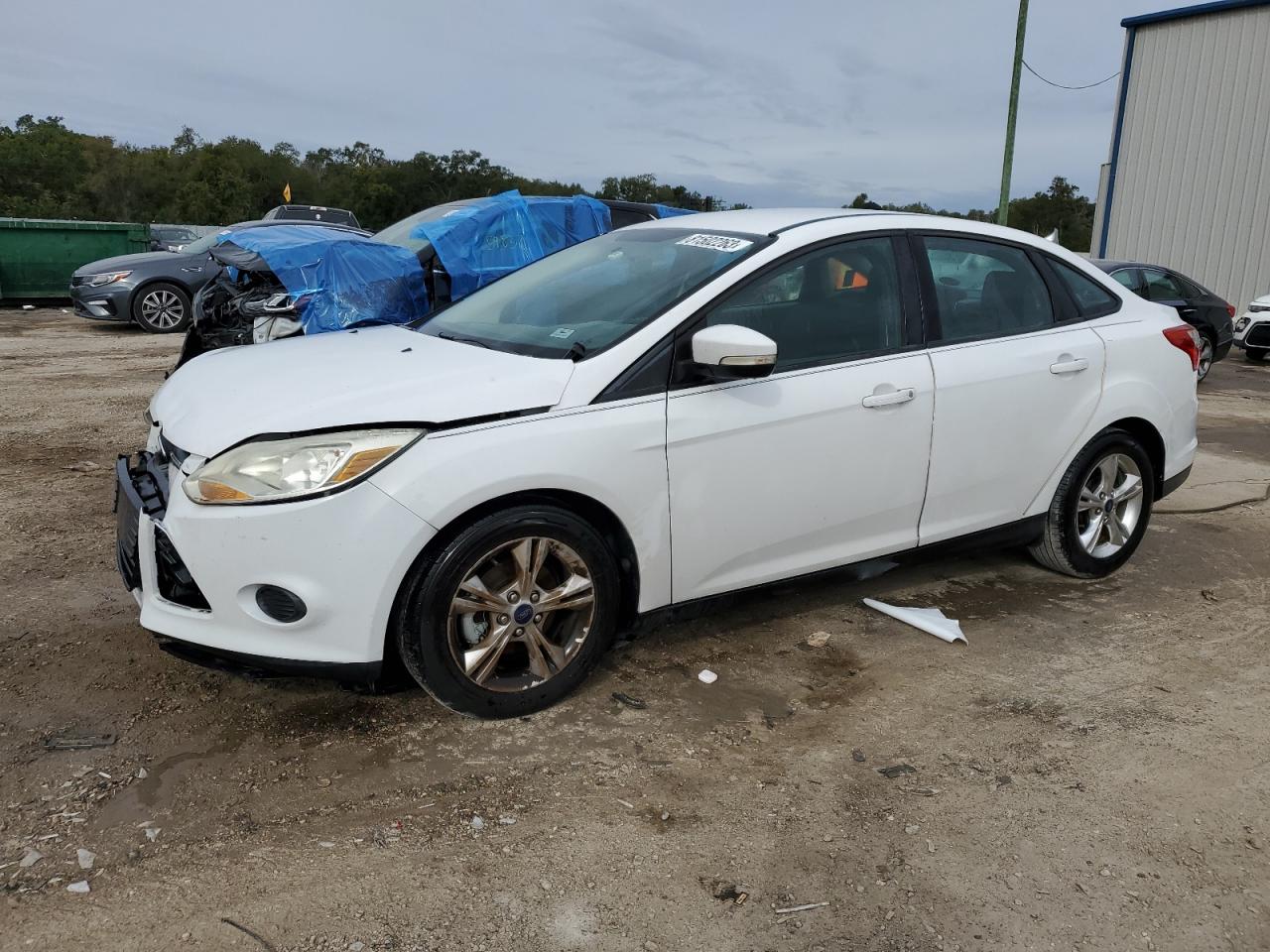 Obraz 1 z 2013 FORD FOCUS SE 2013 z VIN 1FADP3F24DL302456