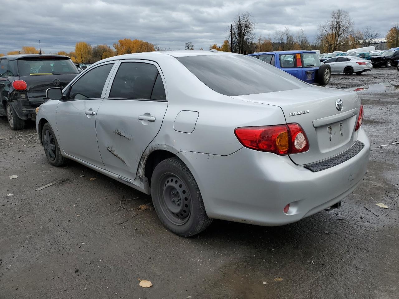 Image 2 of 2009 TOYOTA COROLLA BASE 2009 with VIN 1NXBU40E09Z011114