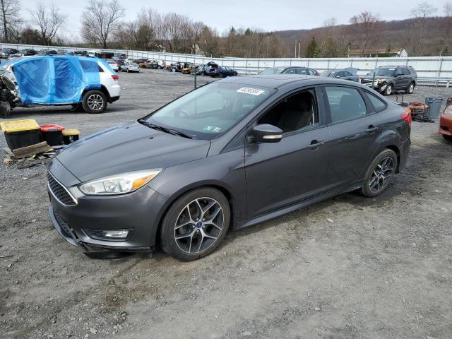 Image 1 of 2015 FORD FOCUS SE 2015 with VIN 1FADP3F2XFL237731