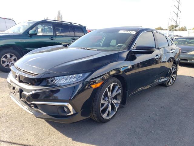 Image 1 of 2019 HONDA CIVIC TOURING 2019 with VIN 19XFC1F97KE203684