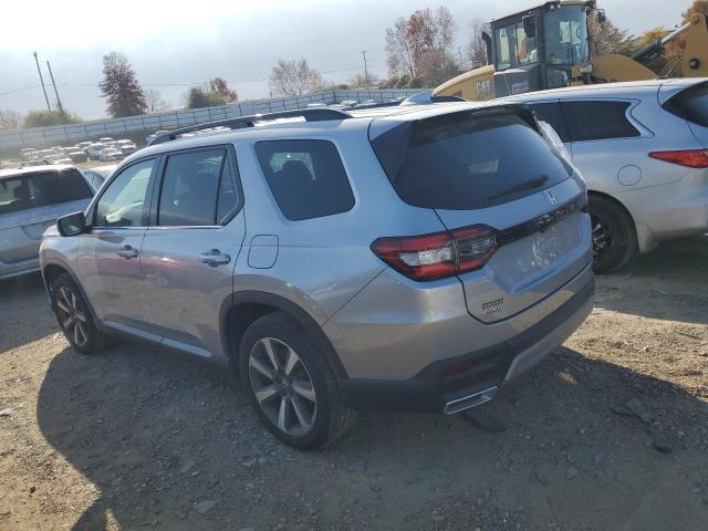Изображение 2 2023 HONDA PILOT TOURING 2023 с VIN 5FNYG1H72PB012748