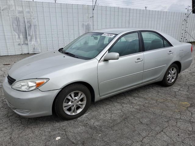 Obraz 1 z 2004 TOYOTA CAMRY LE 2004 z VIN 4T1BF32K44U580225