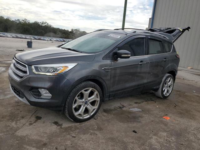 Image 1 of 2017 FORD ESCAPE TITANIUM 2017 with VIN 1FMCU9J97HUA90766