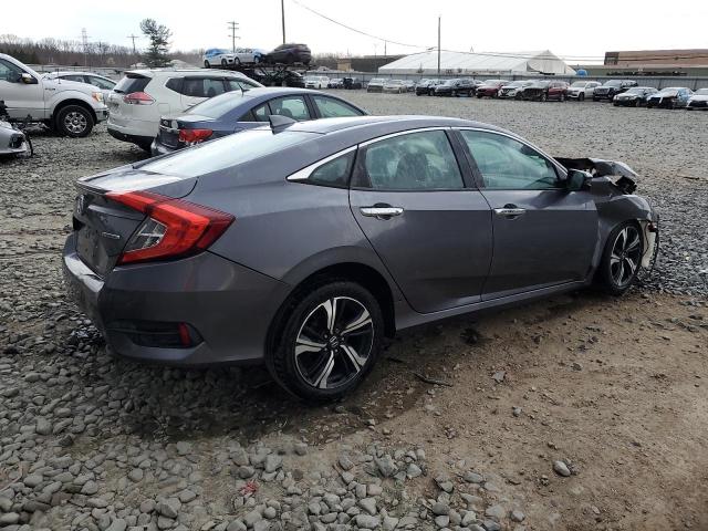 Obraz 3 z 2016 HONDA CIVIC TOURING 2016 z VIN 2HGFC1F97GH630702