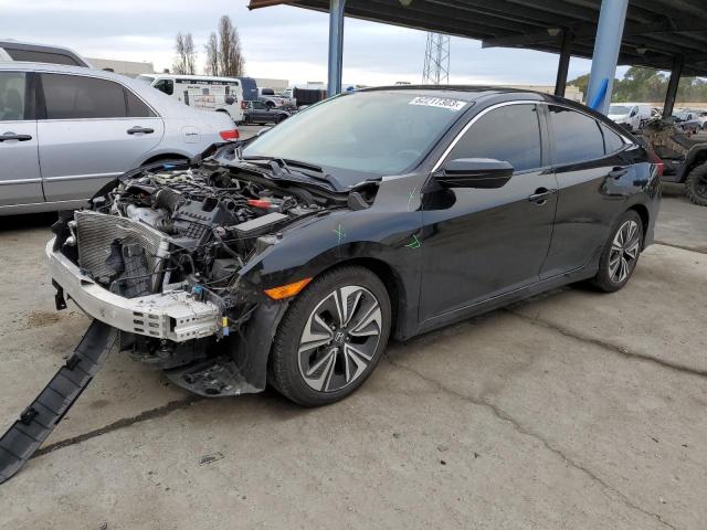 Image 1 of 2016 HONDA CIVIC EXL 2016 with VIN 19XFC1F71GE204044