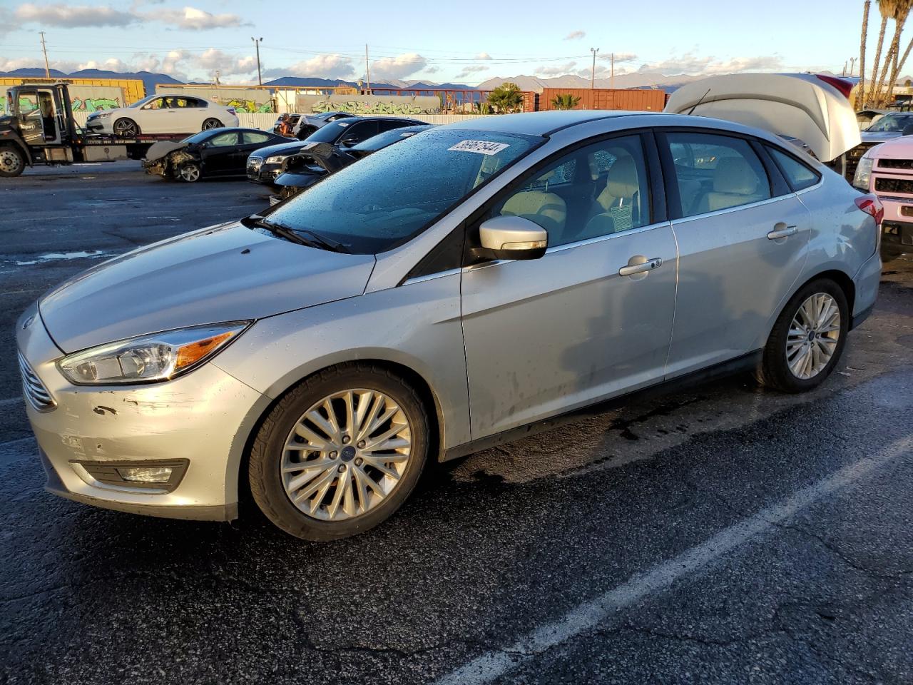 Obraz 1 z 2015 FORD FOCUS TITANIUM 2015 z VIN 1FADP3J27FL341424