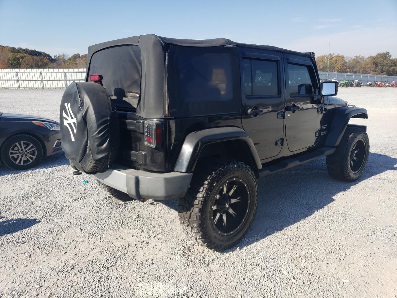 Изображение 3 Jeep Wrangler Unlimited Sahara 2009 с VIN 1J8GA59189L739402