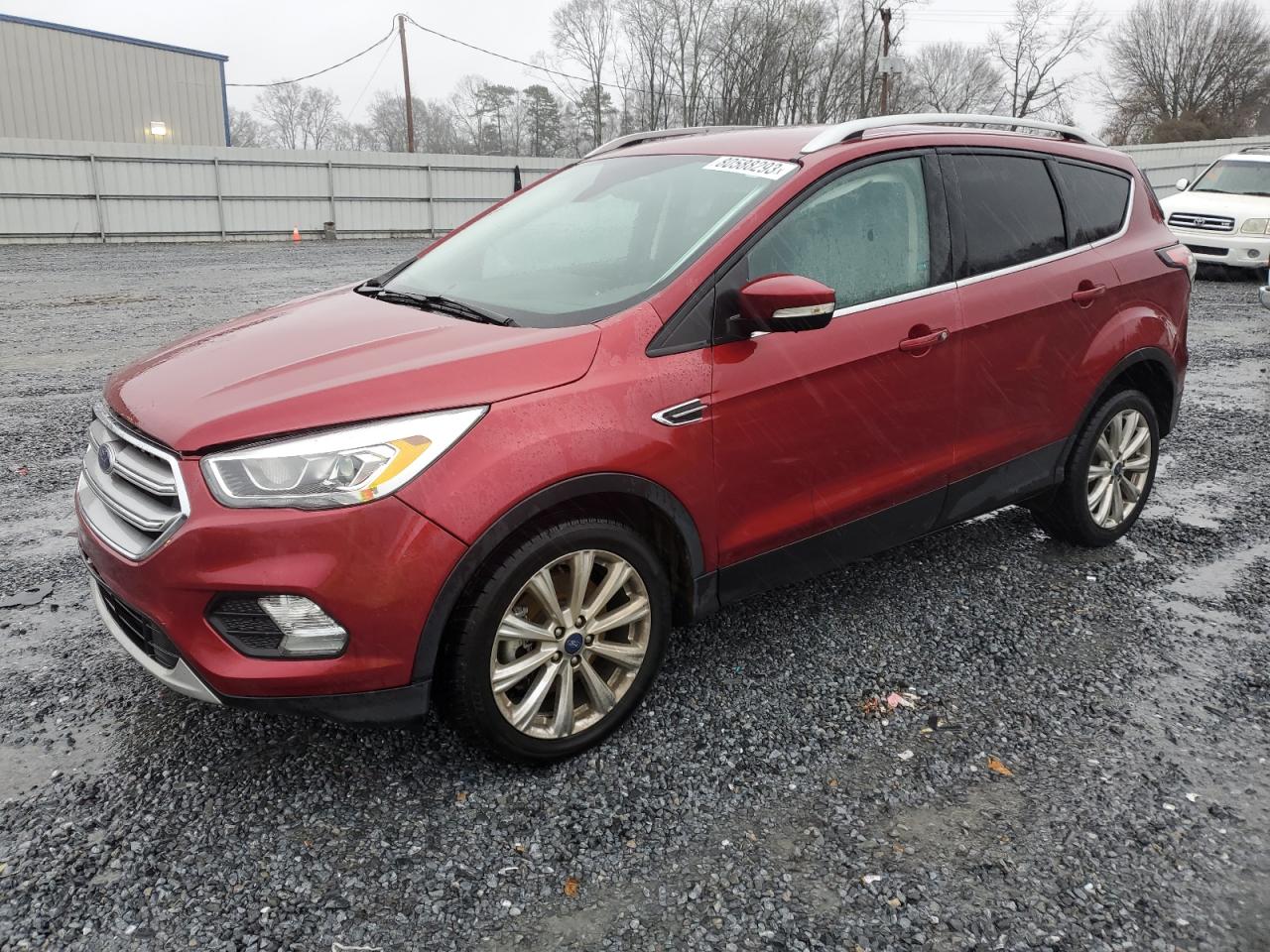 Obraz 1 z 2017 FORD ESCAPE TITANIUM 2017 z VIN 1FMCU0J99HUA57618