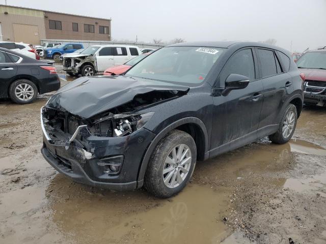 Image 1 of 2016 MAZDA CX-5 TOURING 2016 with VIN JM3KE4CY9G0881799