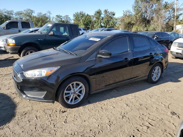Image 1 of 2018 FORD FOCUS SE 2018 with VIN 1FADP3F2XJL237141