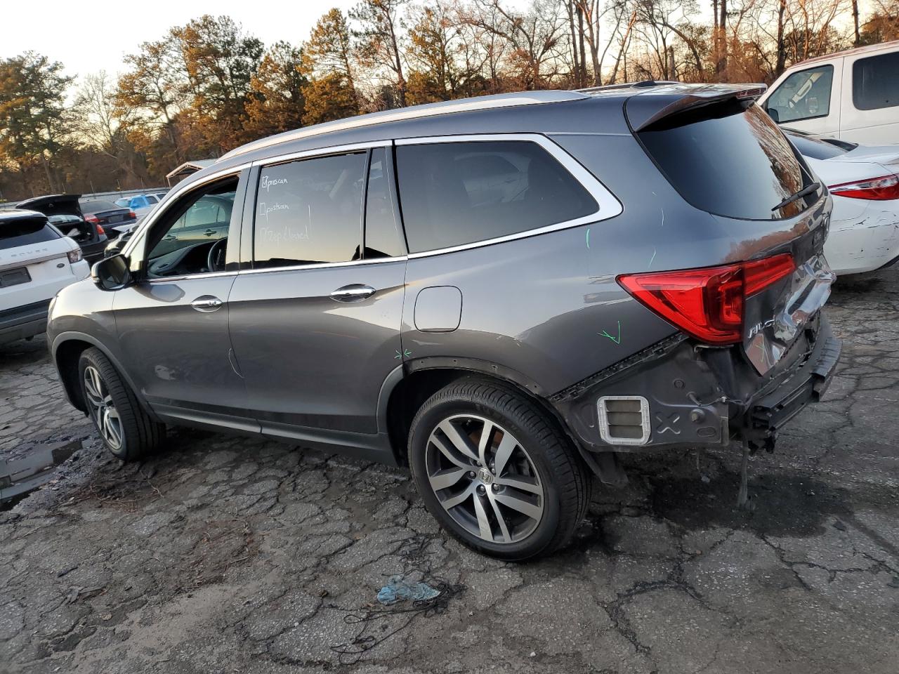 Изображение 2 2016 HONDA PILOT TOURING 2016 с VIN 5FNYF6H96GB010115