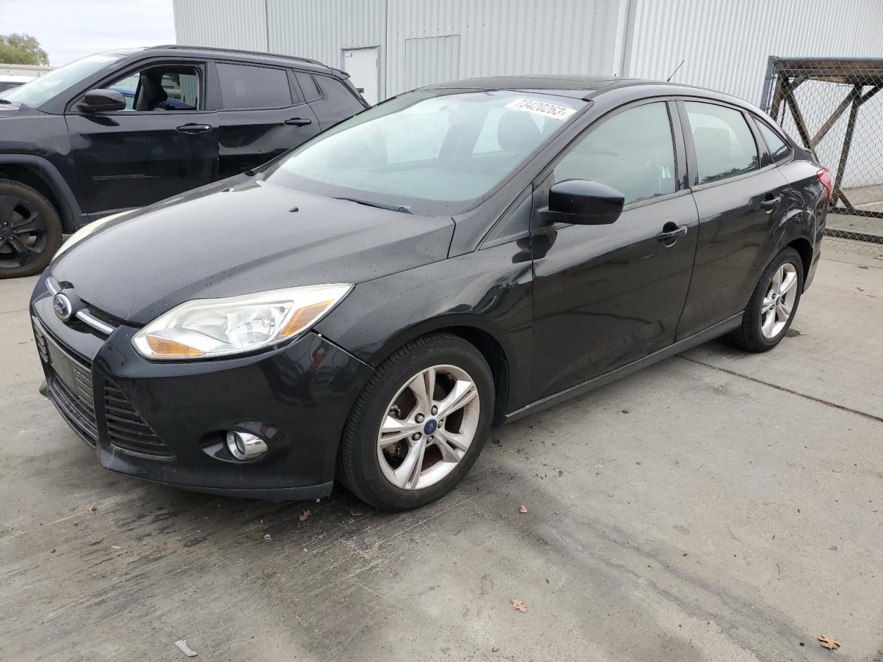Image 1 of 2012 FORD FOCUS SE 2012 with VIN 1FAHP3F29CL423497