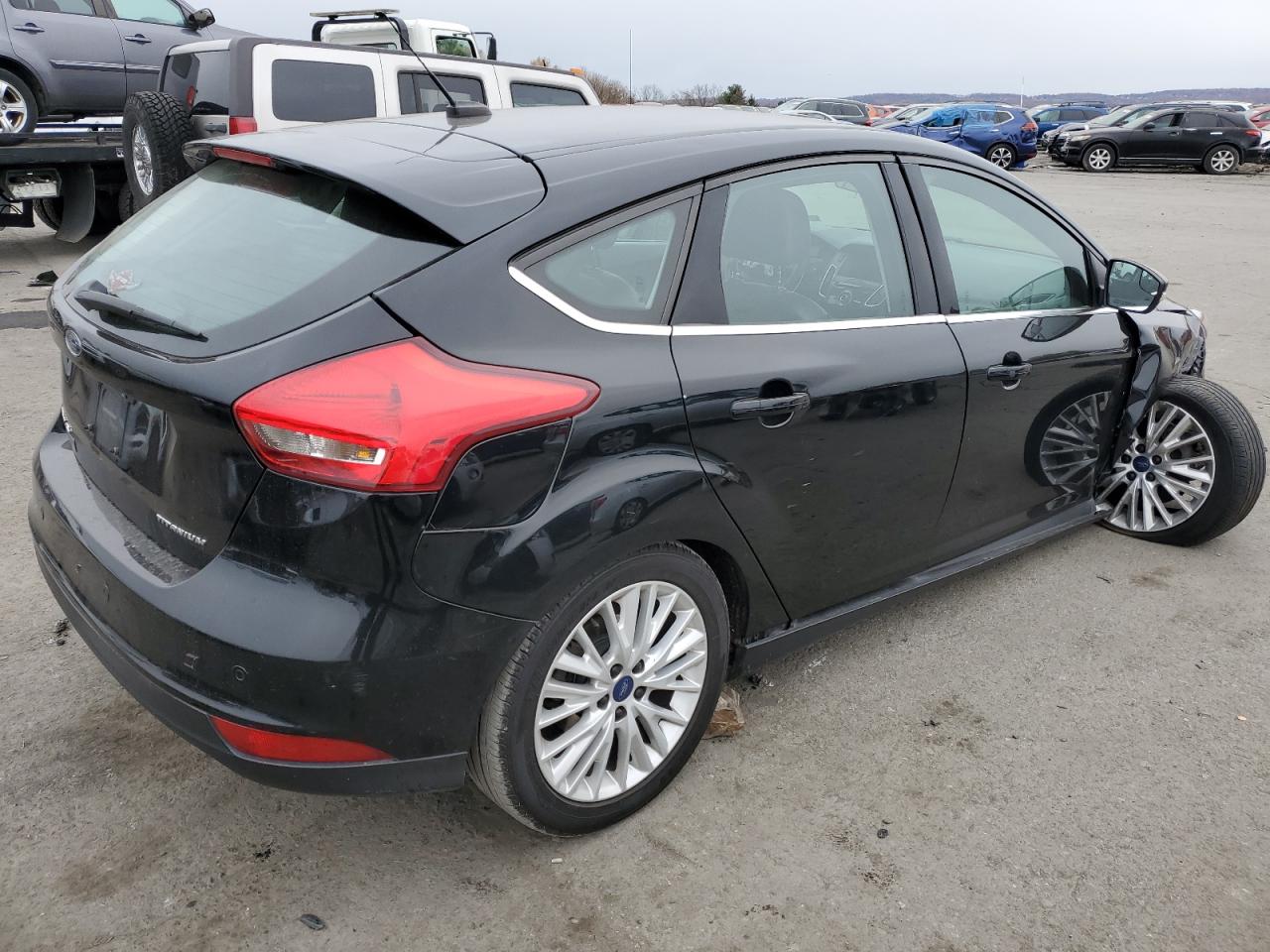 Image 3 of 2017 FORD FOCUS TITANIUM 2017 with VIN 1FADP3N23HL333771